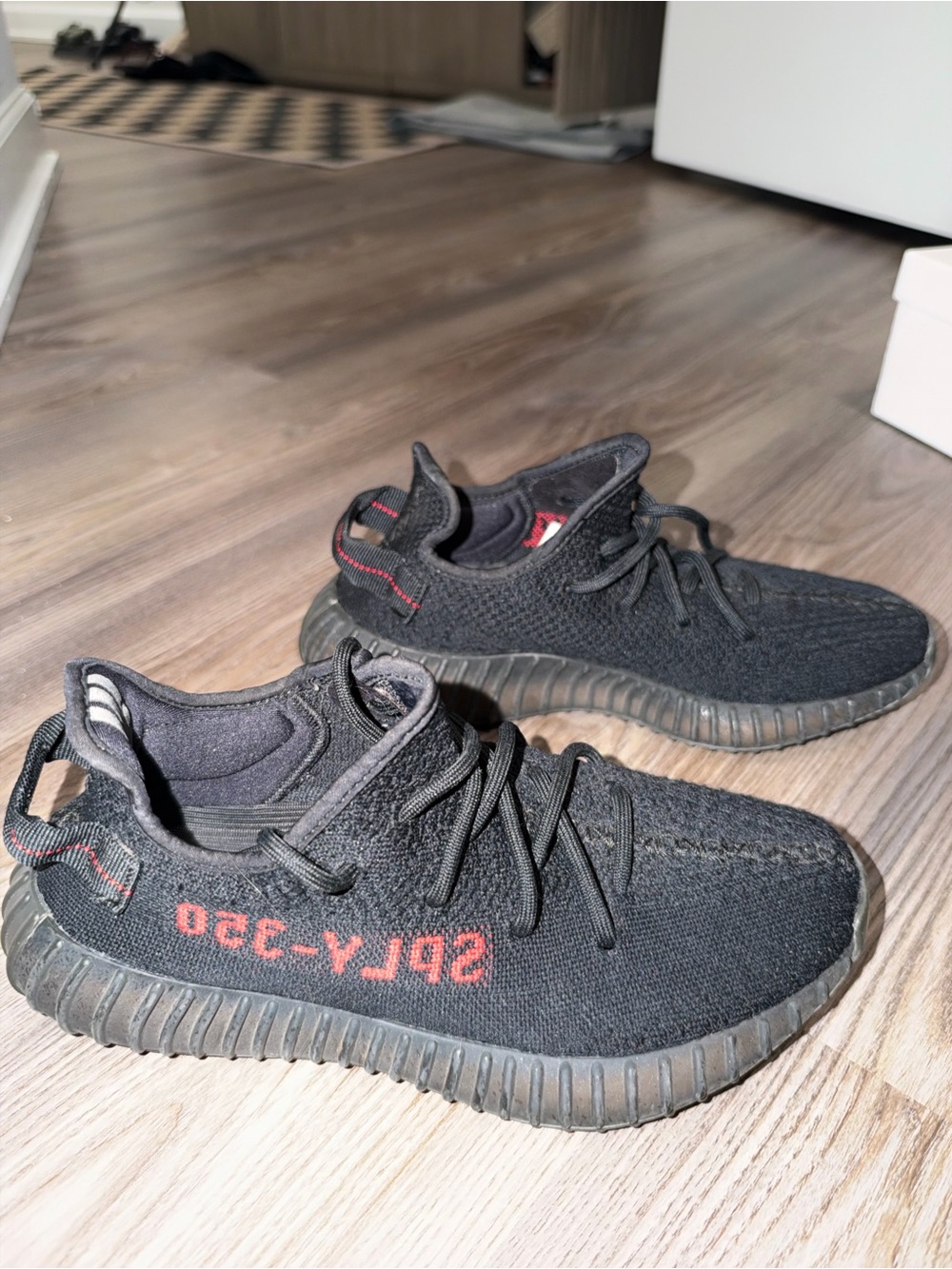 Yeezy Boost 350 V2 Black with Red Stripe Lettering